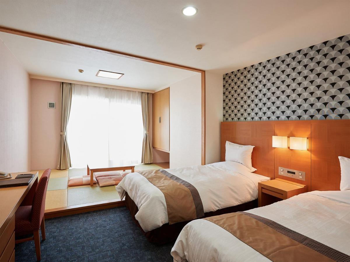 Hotel Murasakimura Yomitan Bagian luar foto