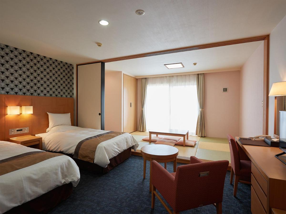 Hotel Murasakimura Yomitan Bagian luar foto