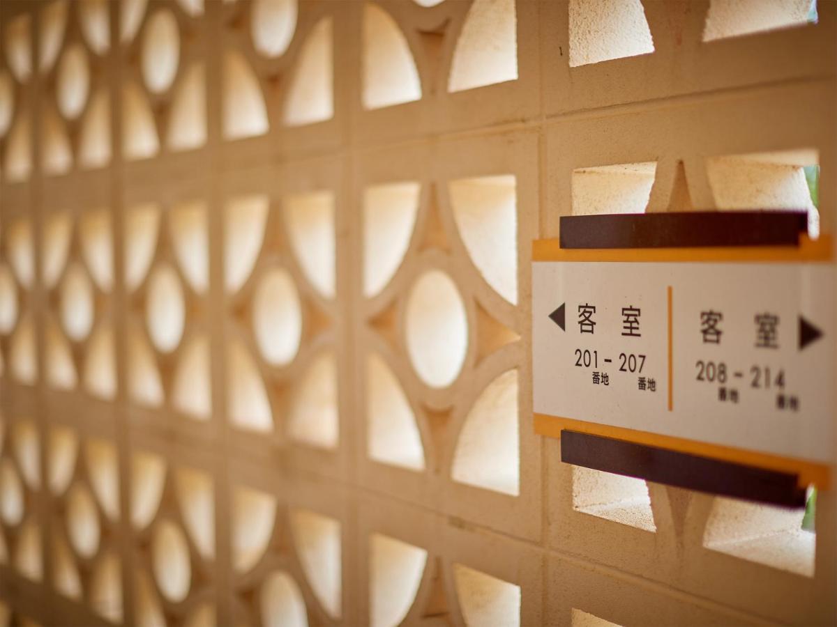 Hotel Murasakimura Yomitan Bagian luar foto