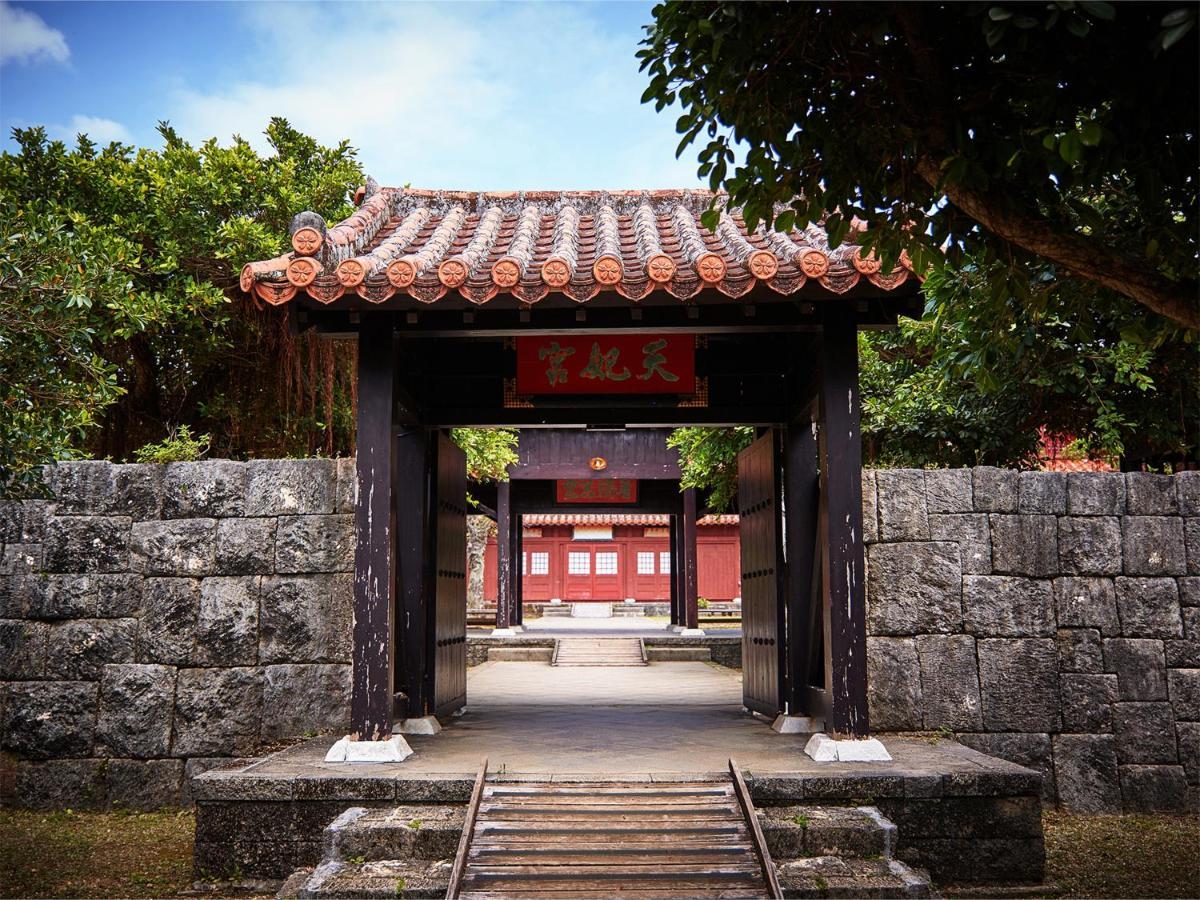 Hotel Murasakimura Yomitan Bagian luar foto
