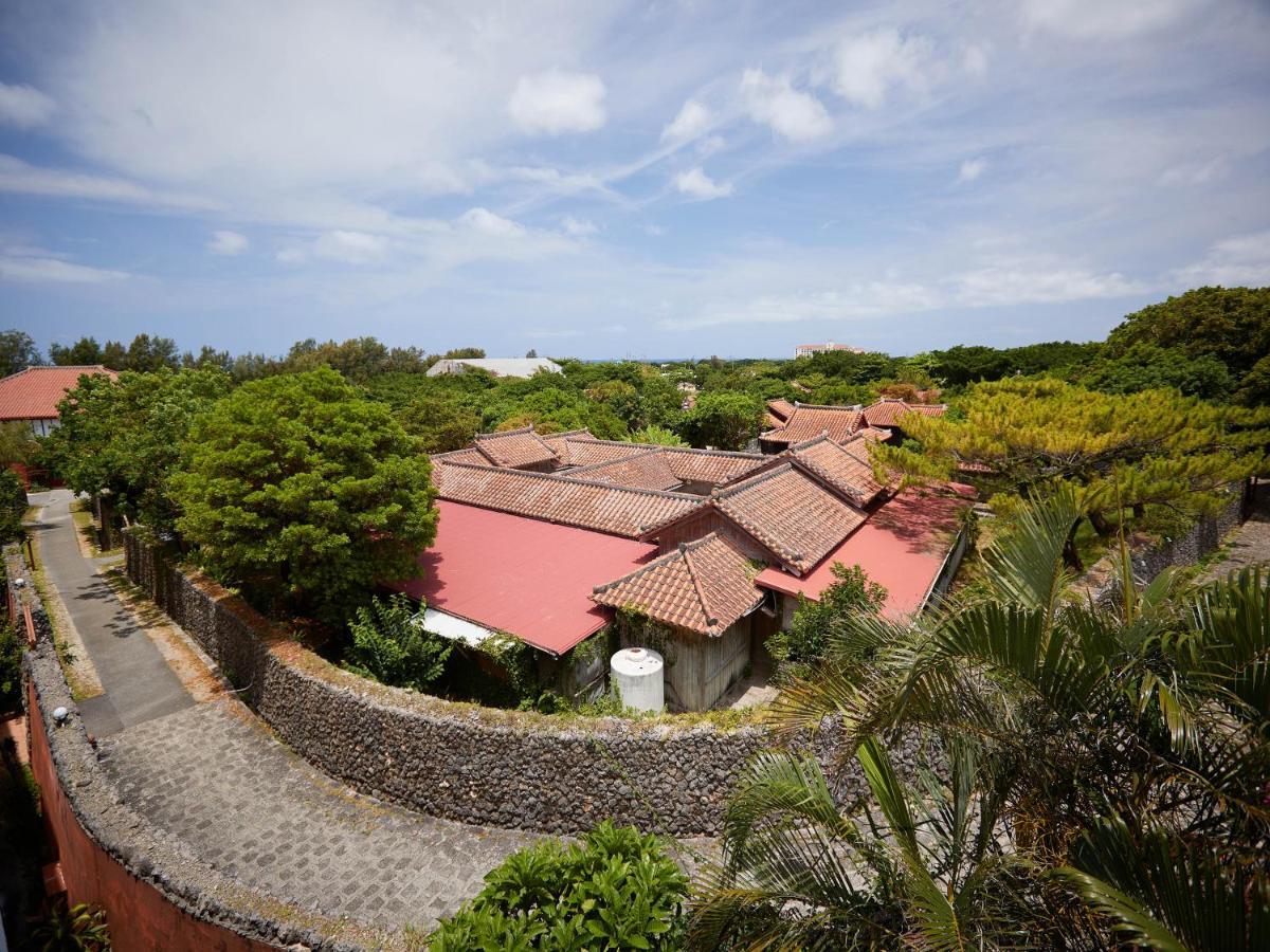 Hotel Murasakimura Yomitan Bagian luar foto