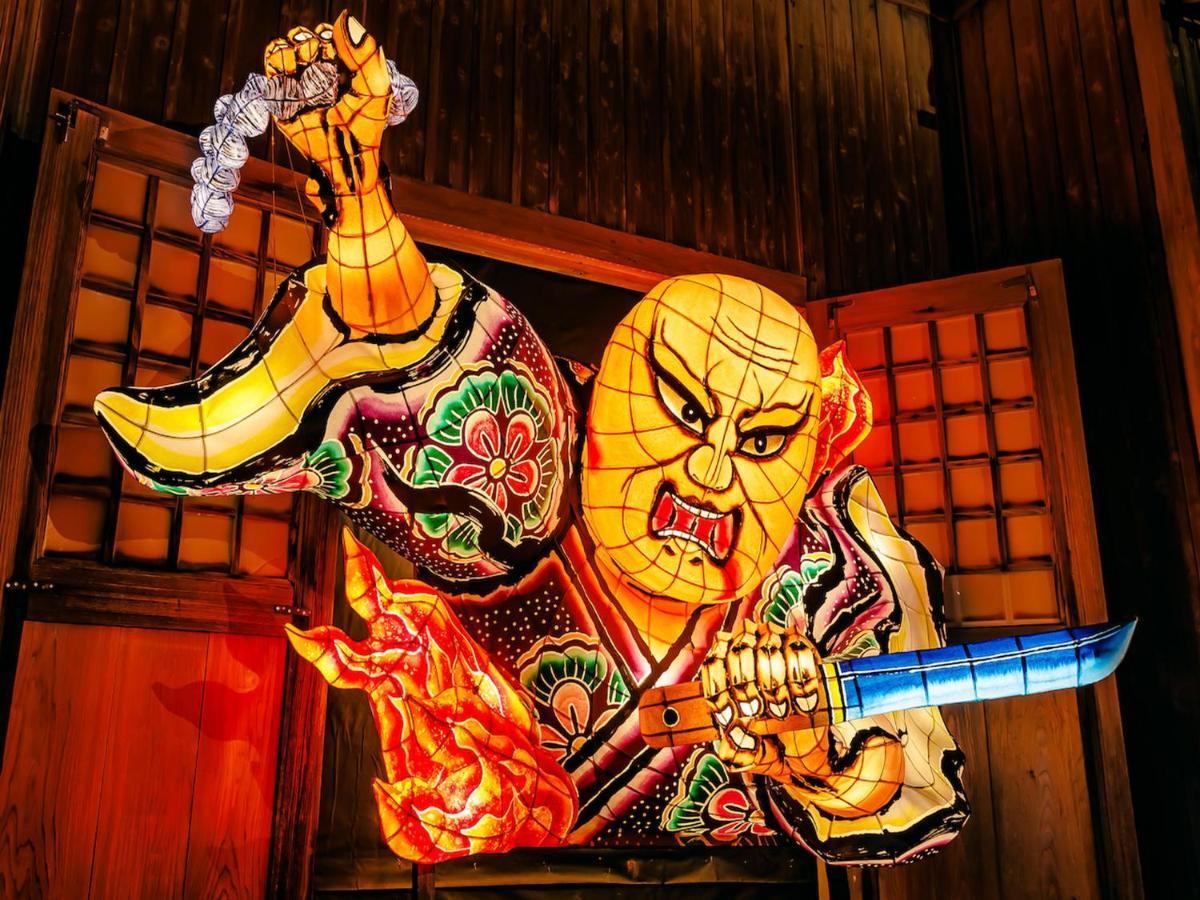 Hotel Murasakimura Yomitan Bagian luar foto